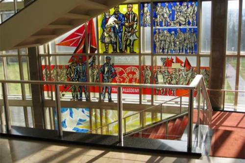 This is inside the ESMT Berlin campus when I visited.  I was impressed by the Communist stained glass they kept from the days of East Germany.